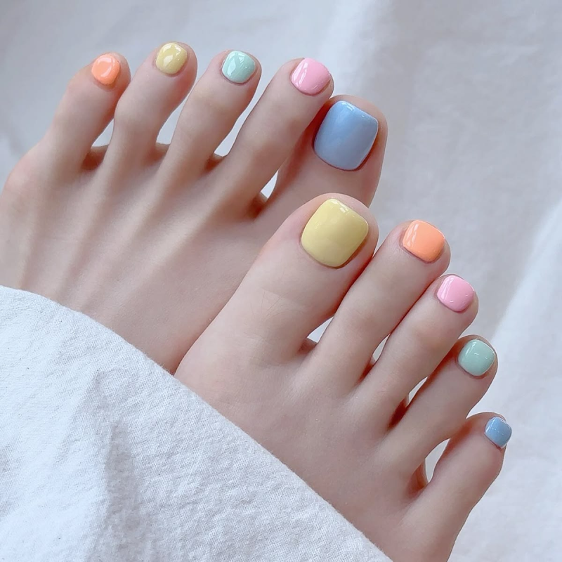 Pastel rainbow pedicure for summer. Pastel rainbow pedicure for summer.