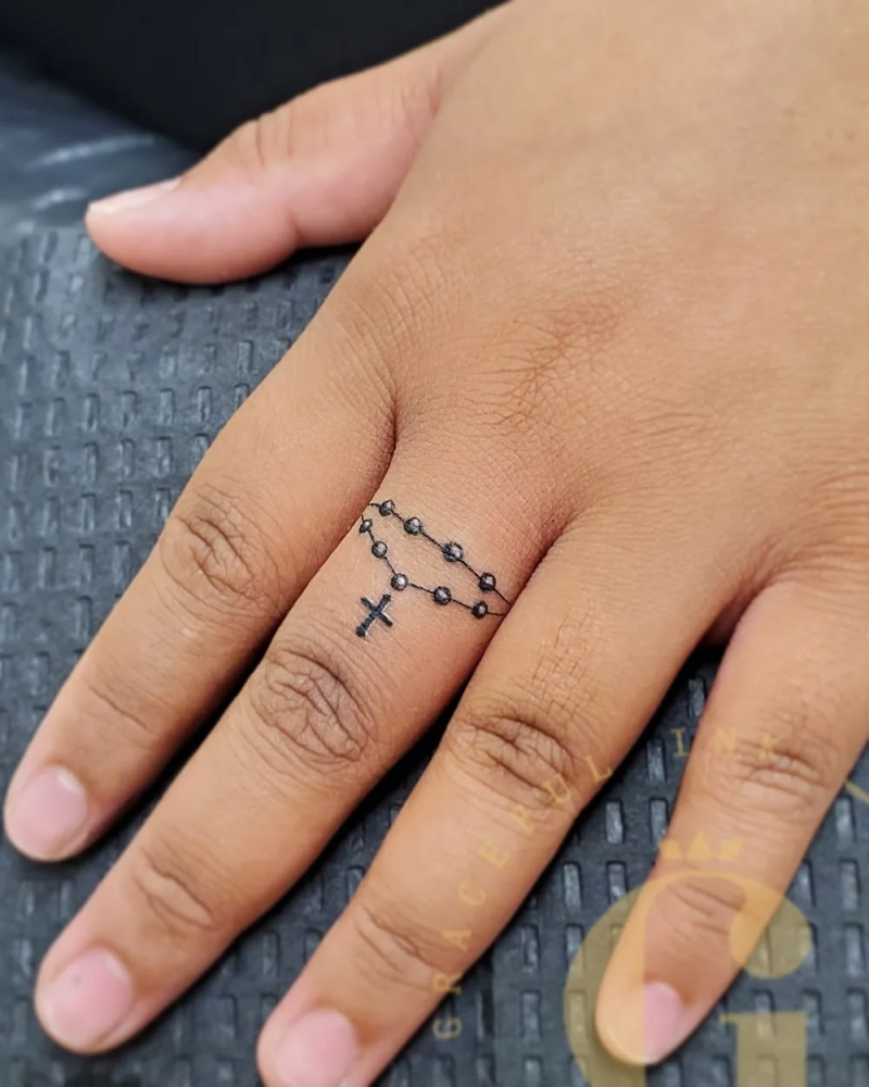 Dainty finger tattoo ideas - rosary.