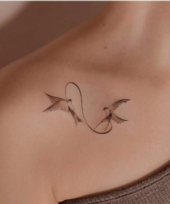 Two birds elegant tattoo ideas.