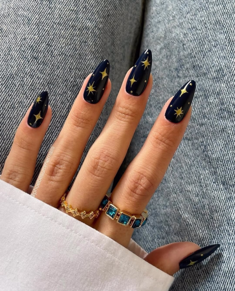Navy blue with gold star fall celestial nails