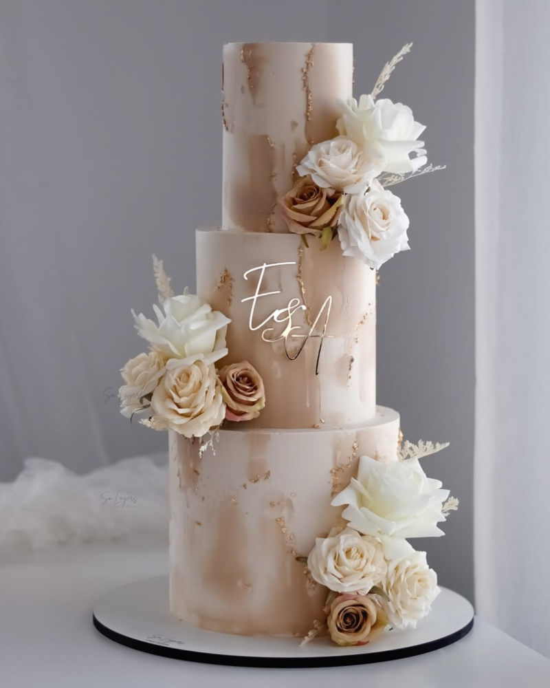 Champagne colored marbled wedding cake with tiers Champagne colored marbled wedding cake with tiers