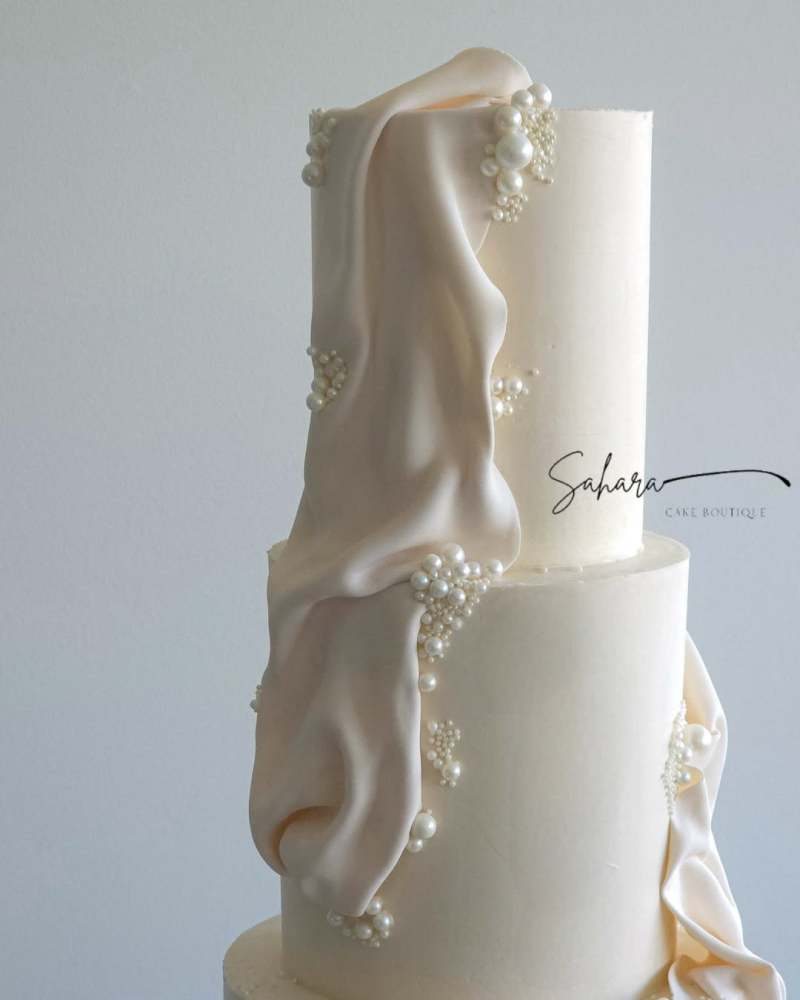 Fondant-draped modern wedding cake design Fondant-draped modern wedding cake design