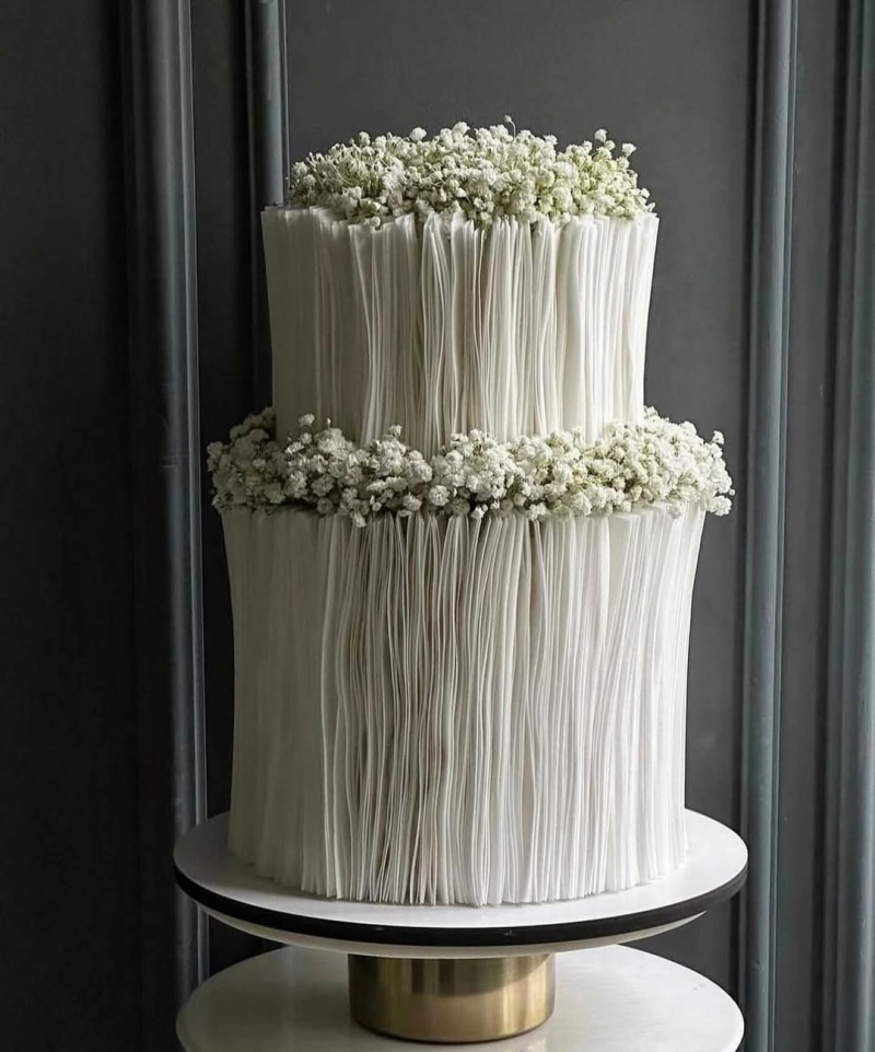 Wedding cake with vertical wafer paper detailing Wedding cake with vertical wafer paper detailing