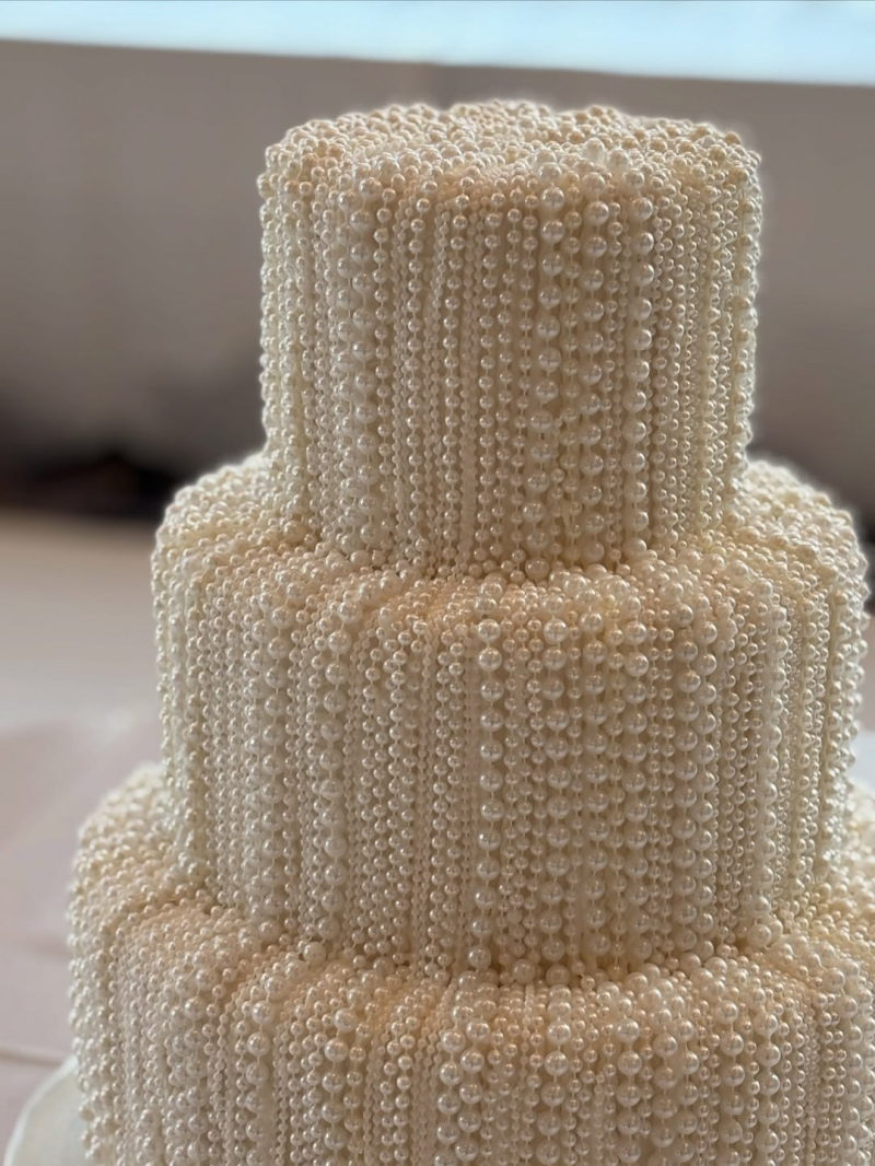 Wedding cake covered in pearls. Wedding cake covered in pearls.