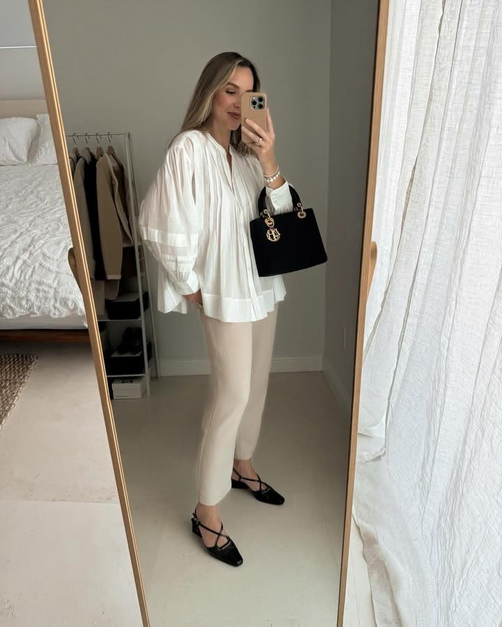 Loose blouse and pants casual chic date outfit idea.