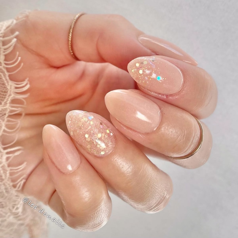 Beige nude almond nails with glitter. Bridal nails, engagement nails, classy nails.