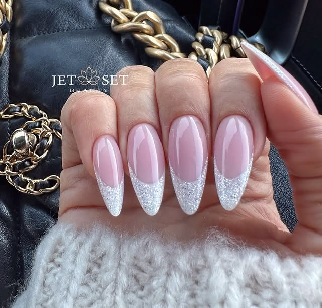 Nude pink French tipped nails with glitter. Engagement nails Wedding nails. Prom nails.
