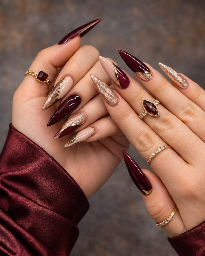 pointed-long-red-and-gold-burgundy-nails